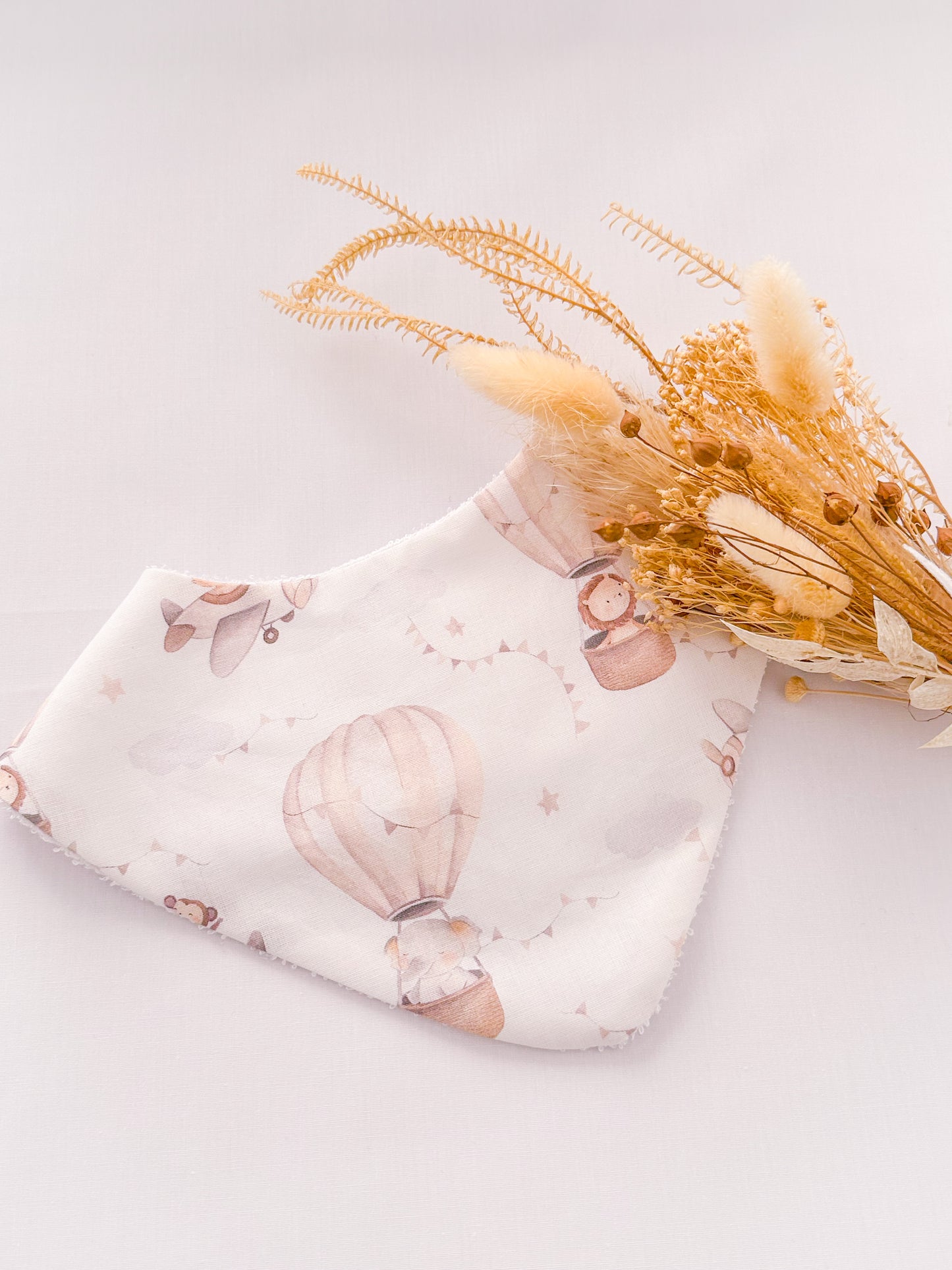 Babero Globos marrón